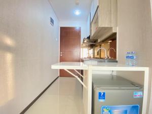 Comfy Studio at Gateway Pasteur Apartment By Travelio