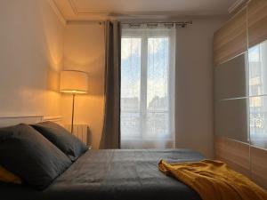 Appartements Charmant 2 pieces a deux pas de Paris : photos des chambres
