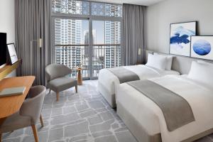 City View Deluxe Room Twin - Free Shuttle to Dubai Mall & La Mer Beach room in Vida Creek Harbour