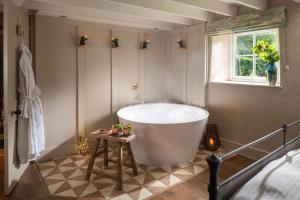 Topsy Turvy and Hillside Spa at Tregoose Old Mill