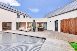 Maisons de vacances 800m de la plage, maison neuve pour 10, piscine : photos des chambres