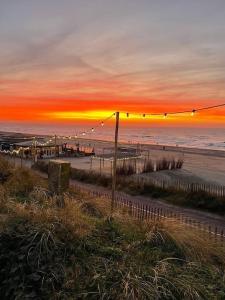 Cozy beachfront apartment central in town