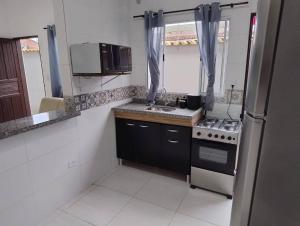 Casa com piscina em Itanhaem