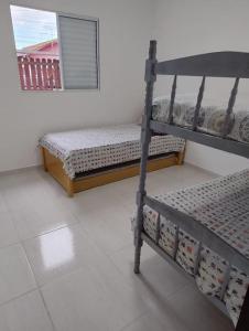 Casa com piscina em Itanhaem