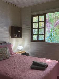 Um Chalé aconchegante no sítio em meio a natureza.