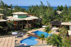 107 - Village aconchegante na praia de Itacimirim