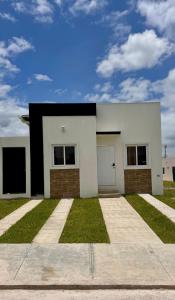 Casa cómoda cerca Aeropuerto Palmerola fácil acceso