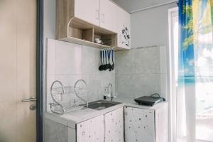 Homey and Simply 2BR Apartment Aeropolis Residence By Travelio