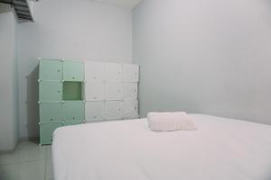 Homey and Simply 2BR Apartment Aeropolis Residence By Travelio