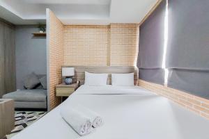 Warm and Simply Look Studio Room Apartment Urban Heights Residences By Travelio