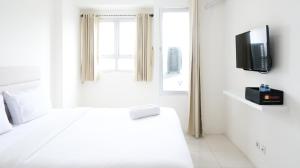 Cozy Stay Studio at Puncak Permai Apartment By Travelio