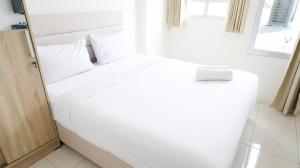 Cozy Stay Studio at Puncak Permai Apartment By Travelio