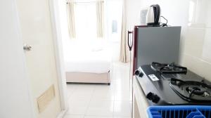 Cozy Stay Studio at Puncak Permai Apartment By Travelio