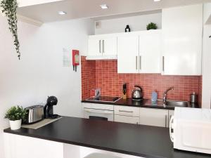 Apartamento Jasmina en Garden City y piscina climatizada