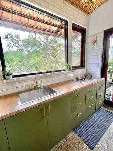 Village house with cozy kitchen & nice view - Tjibiru