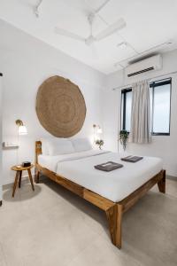 Earthy 1BHK Bandra W by The Bombay Home Company