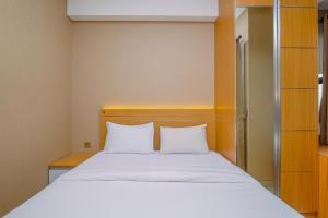 Minimalist and Comfy Studio at Transpark Cibubur Apartment By Travelio