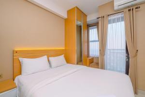 Minimalist and Comfy Studio at Transpark Cibubur Apartment By Travelio