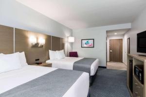 Queen Room with Two Queen Beds - Non-Smoking room in Days Inn & Suites by Wyndham Houston NW Cypress