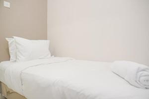 Nice and Modern 2BR at Green Pramuka City Apartment By Travelio