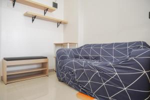 Nice and Modern 2BR at Green Pramuka City Apartment By Travelio