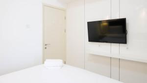 Spacey and Homey 2BR at Supermall Mansion Apartment By Travelio