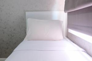 Homey and Cozy 2BR Apartment at Parahyangan Residence By Travelio