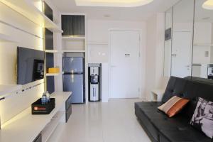 Homey and Cozy 2BR Apartment at Parahyangan Residence By Travelio