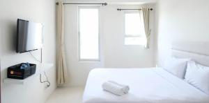 Best Deal and Comfy Studio at Puncak Kertajaya Apartment By Travelio