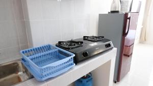 Best Deal and Comfy Studio at Puncak Kertajaya Apartment By Travelio