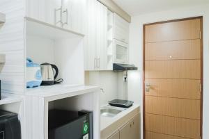 Comfort Stay Studio at Vida View Makassar Apartment By Travelio