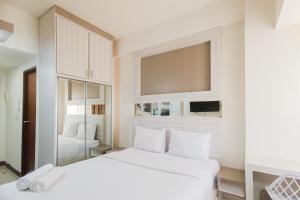 Comfort Stay Studio at Vida View Makassar Apartment By Travelio
