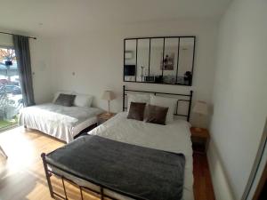 Appartements Appart'hotel Le Clos Lassagne a Brignais - Lyon Sud : photos des chambres