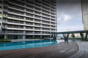 1BR Condotel with Balcony at FAME Residences #FM63