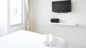 Best Choice and Cozy Stay Studio at Puncak Kertajaya Apartment By Travelio