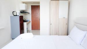 Best Choice and Cozy Stay Studio at Puncak Kertajaya Apartment By Travelio
