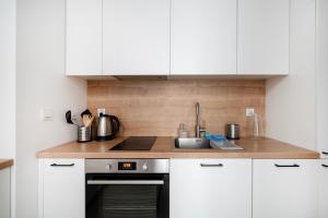 Manufaktura Deluxe Apartment by BookingHost