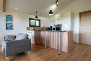 Maisons de vacances Kergueguen - Charmante maison avec jardin : photos des chambres