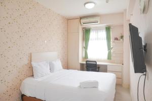 Good Deal 1BR Green Pramuka City near Mall Apartment By Travelio