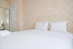 Good Deal 1BR Green Pramuka City near Mall Apartment By Travelio