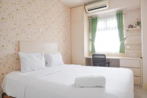 Good Deal 1BR Green Pramuka City near Mall Apartment By Travelio