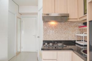 Good Deal 1BR Green Pramuka City near Mall Apartment By Travelio