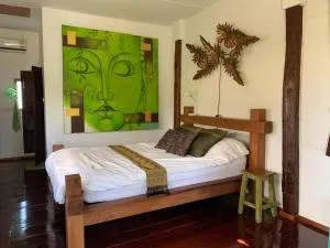 บ้านพักริมทุ่งนา - Bān San Pu Loi