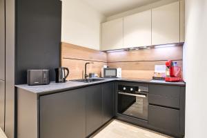 Cosy One-Bedroom Apartment in Mercury Tower by Zaha Hadid