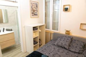 Appartements Joli studio Clim & Wifi : photos des chambres