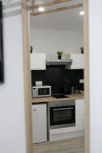 Appartements Joli studio Clim & Wifi : photos des chambres