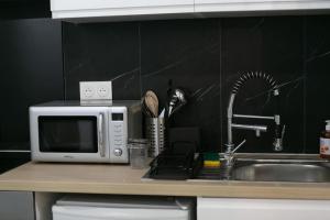 Appartements Joli studio Clim & Wifi : photos des chambres