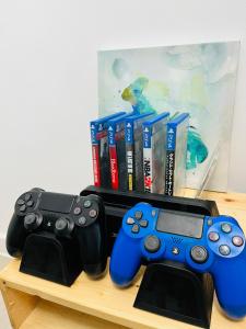 Beach Vibe Condo with PS4, Mini Karaoke, Board Games in Azure North San Fernando Pampanga