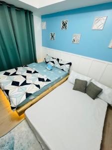 Beach Vibe Condo with PS4, Mini Karaoke, Board Games in Azure North San Fernando Pampanga