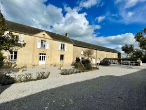 B&B / Chambres d'hotes Les chambres d'Omaha Beach Etablissement avec deux chambres d'hotes, petit-dejeuner compris fait-maison et produits locaux : photos des chambres